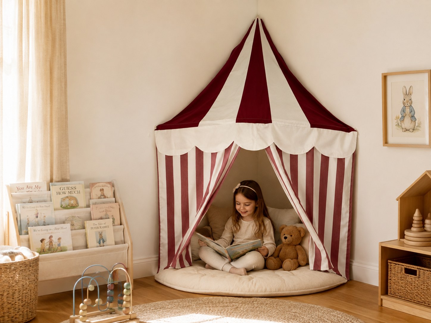 Child reading inside the Burgundy Circus corner tent
